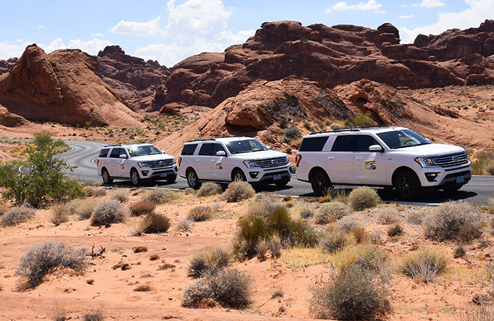 Adventure Photo Tours SUV fleet in the desert